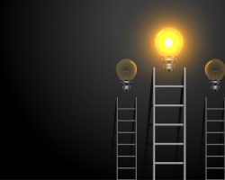 success concept ladder with glowing light bulb